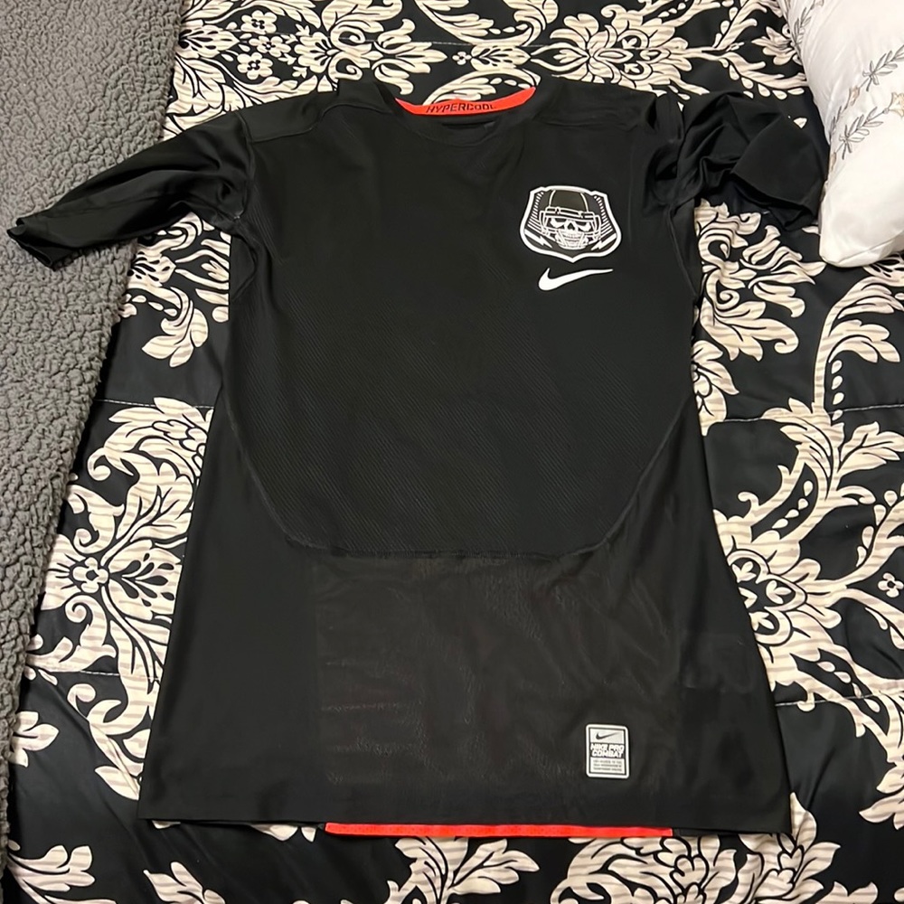 Men’s Nike pro-combat football shirt.